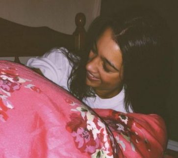 International Student is resting in bed.